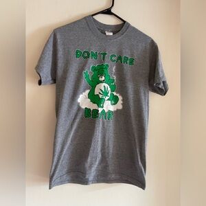One of a kind Tee. Gray T-Shirt with green Care Bear Graphic.